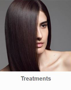 Model with brown hair showing result of hair treatment